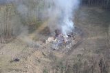 Letecký pohled na hořící sklad v muničním areálu ve Vrběticích