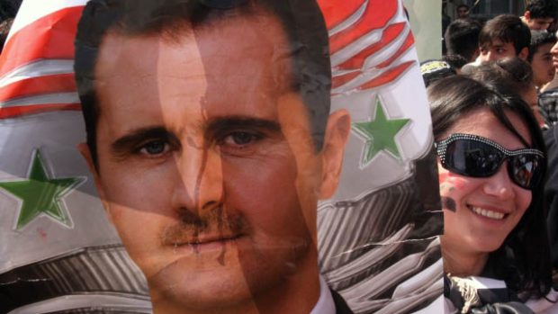 Syrský prezident Bašár Asad na plakátu svých příznivců
