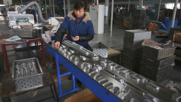 Čínští představitelé poprvé připustili možné zpomalení své ekonomiky