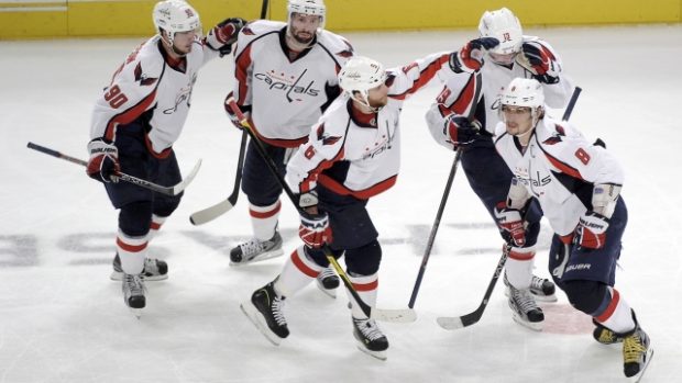Washington Capitals&#039; Alex Ovechkin  (8) celebrates with teammates Nicklas Backstrom (19) Dennis Wideman (6), Troy Brouwer (20) and Marcus Johansson (L) after scoring on the New York Rangers during the third period in Game 2 of their NHL