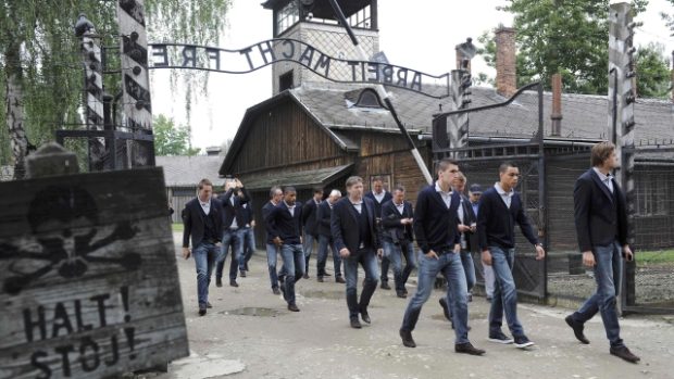 Netherlands&#039; national soccer players walk through Auschwitz&#039;s notorious gate with the sign &quot;Arbeit Macht Frei&quot; (Work sets you free) during their visit to the former Nazi concentration camp in Oswiecim June 6, 2012