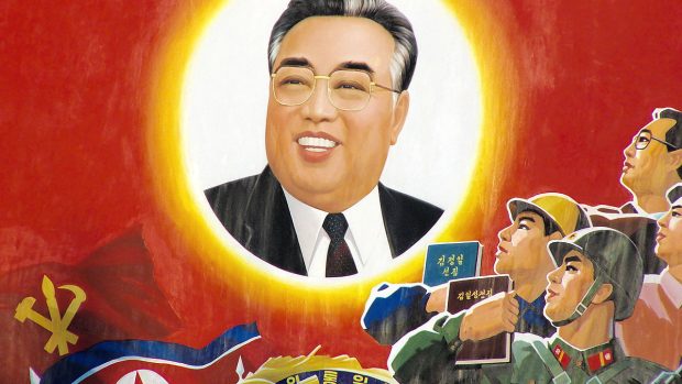 Propagační plakát s portrétem Kim Čong-ila