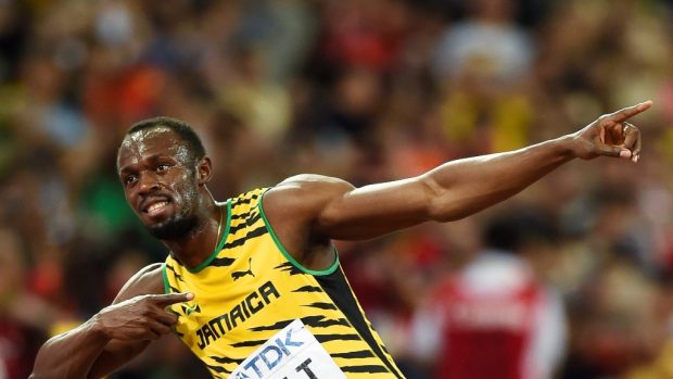 Jamajčan Bolt slaví na atletickém MS v Pekingu vítězství ve sprintu na 100 metrů