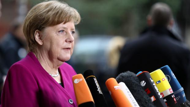 Angela Merkelová před koaličními jednáními s SPD