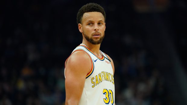 Basketbalista Stephen Curry v dresu Golden State Warriors