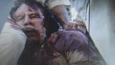 Snímek z videa zachycuje zraněného muže, údajně Muammara Kaddáfího