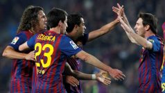 Barcelona&#039;s Carles Puyol, Isaac Cuenca, Xavi Hernandez and Lionel Messi celebrate a goal against Getafe during their Spanish First division soccer match