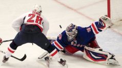 New York Rangers goalie Henrik Lundqvist  (R) makes a save on Washington Capitals&#039; Alexander Semin during the second period in Game 7 of their NHL Eastern Conference semi-final playoff hockey game at Madison Square Garden in New York May 12, 2012