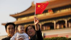 Čínští prarodiče s vnoučetem na návštěvě Pekingu (ilustrační foto)