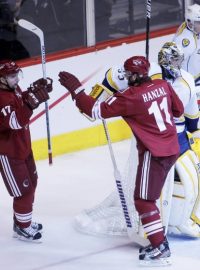 Phoenix Coyotes&#039; Radim Vrbata  (L) celebrates his goal with teammate Martin Hanzal (11) in front of Nashville Predators&#039; goalie Pekka Rinne and Roman Josi (R) during the first period of Game 1 of their NHL Western Conference semi-final hockey playoffs