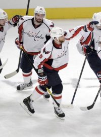 Washington Capitals&#039; Alex Ovechkin  (8) celebrates with teammates Nicklas Backstrom (19) Dennis Wideman (6), Troy Brouwer (20) and Marcus Johansson (L) after scoring on the New York Rangers during the third period in Game 2 of their NHL