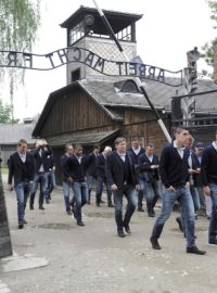 Netherlands&#039; national soccer players walk through Auschwitz&#039;s notorious gate with the sign &quot;Arbeit Macht Frei&quot; (Work sets you free) during their visit to the former Nazi concentration camp in Oswiecim June 6, 2012