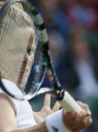 Belgium&#039;s Kim Clijsters  returns to Russia&#039;s Maria Sharapova in their women&#039;s singles quarterfinals tennis match at the All England Lawn Tennis Club during the London  2012 Olympic Games August 2, 2012