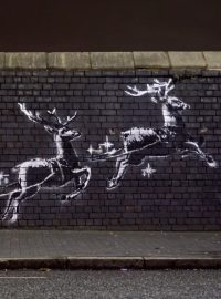 Dílo streetartového umělce Banksyho.