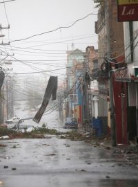 Trosky ve městě Pinar del Rico potom, co se oblastí prohnal hurikán Ian