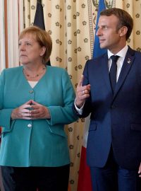 Boris Johnson, Angela Merkelová a Emmanuel Macron