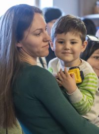 Ukrajinská malířka Anna Kulbanská se synem.